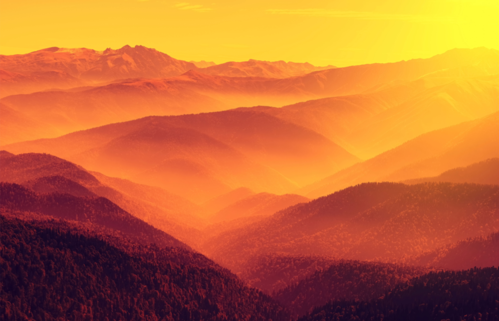 Warme Landschaft Glasbild