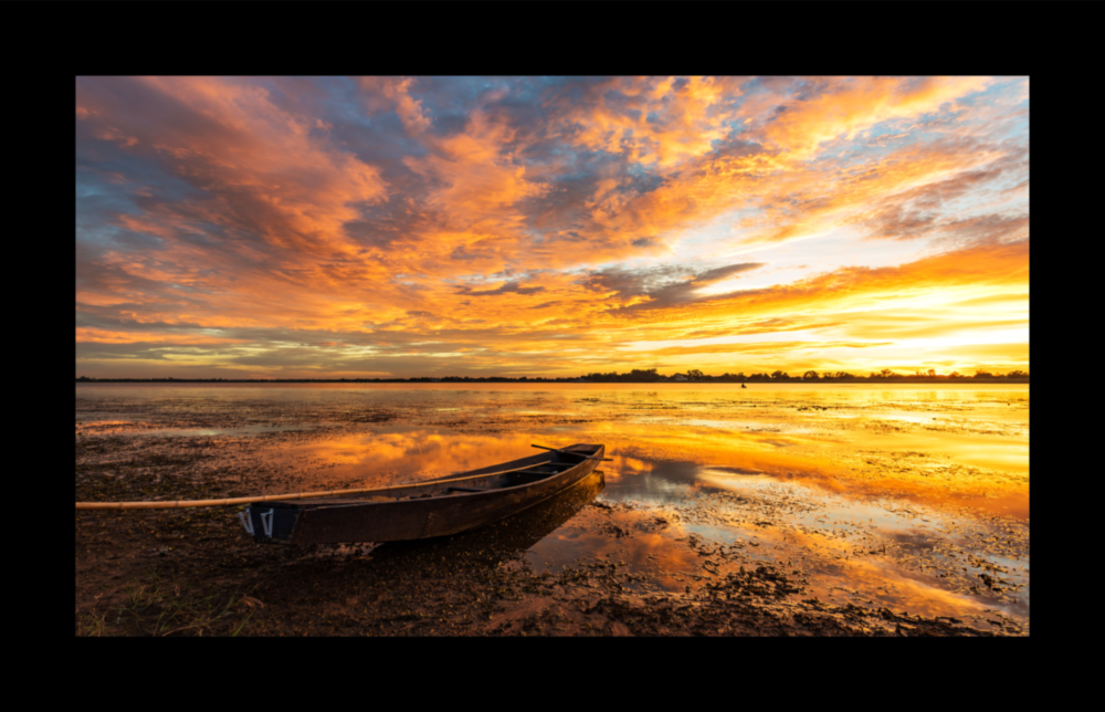 Clouds and Sunset Glass Wall Art