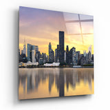 Riflesso nell'Acqua dello Skyline al Tramonto Dorato quadro in vetro - 40x40 cm