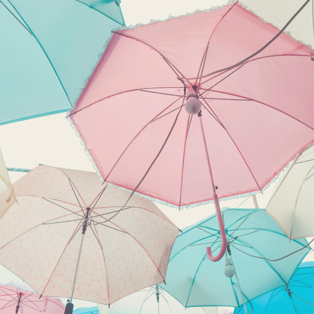 Colorful Umbrellas Glass Wall Art