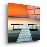 Vivid Orange Sky Teal Lake Dock Glass Wall Art - 40x40 cm