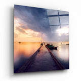 Jetée et bateaux au coucher du soleil tableau en verre - 40x40 cm