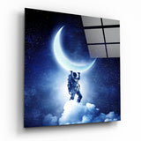 Astronauta che Solleva una Luna Crescente quadro in vetro - 40x40 cm