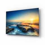 Silky Waves Over Boulders Glass Wall Art - 72x46 cm