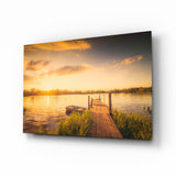 Sonnenuntergang Ruderboot Grasiger Steg Glasbild - 72x46 cm