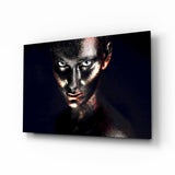 Frau mit blauen Augen und Glitzergesicht Glasbild - 72x46 cm