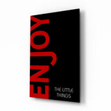 Rote 'Enjoy'-Typografie auf Schwarz Glasbild - 72x46 cm