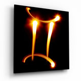 Zwillinge-Symbol mit Flammenlichtspur Glasbild - 40x40 cm