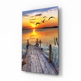 Golden Sun and Seagulls Over Dock Glass Wall Art - 72x46 cm