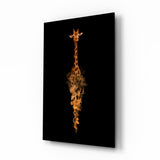 Giraffe mit orangefarbenem Rauch auf Schwarz Glasbild - 72x46 cm