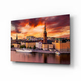 Città vecchia di Stoccolma al tramonto arancione fuoco quadro in vetro - 72x46 cm