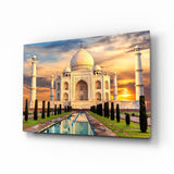 Taj Mahal unter goldenen Strahlenwolken Glasbild - 72x46 cm