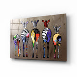 Farbenfrohe Zebras Glasbild